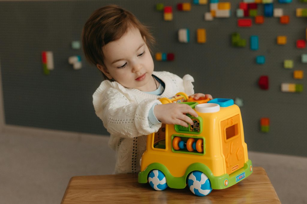 child playing with toy