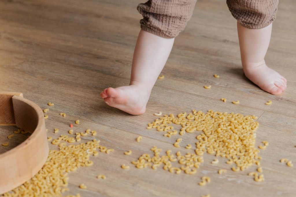 Child walking on textured pasta